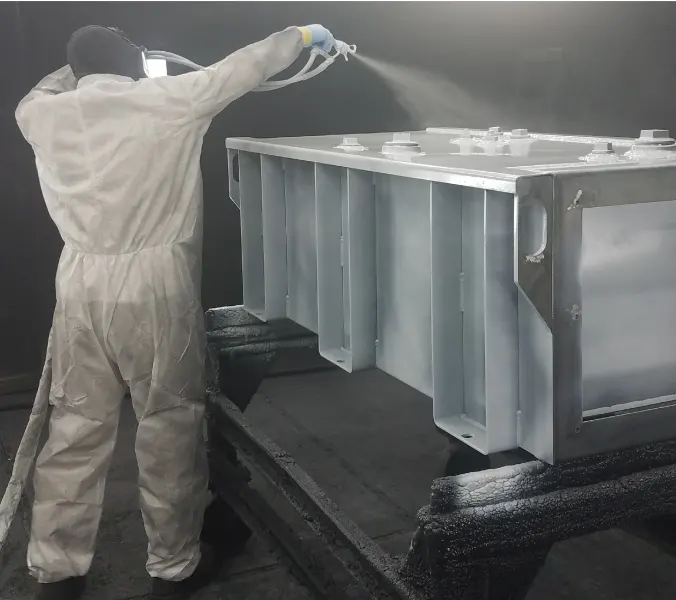 Man spraying paint direct to metal image