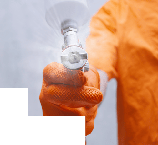paint spray can in worker's hand