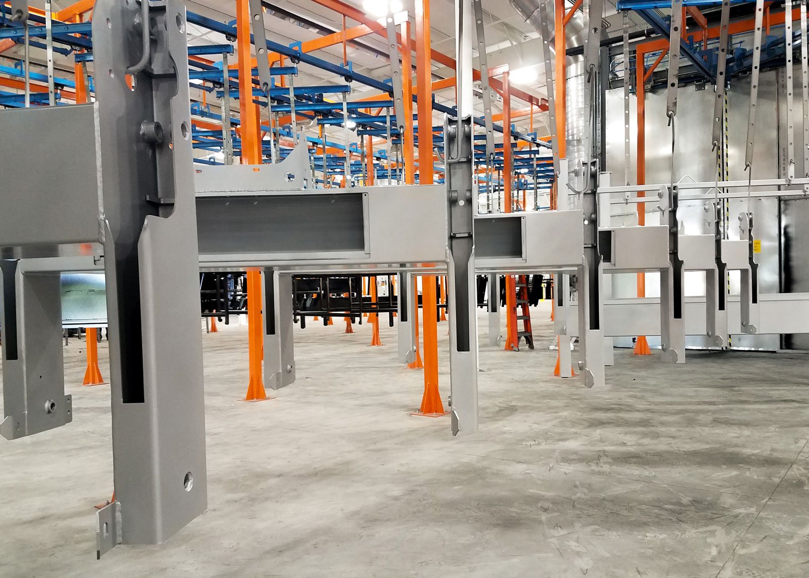 Gray and orange metal machinery